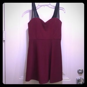 Merlot dress with black see-through straps.